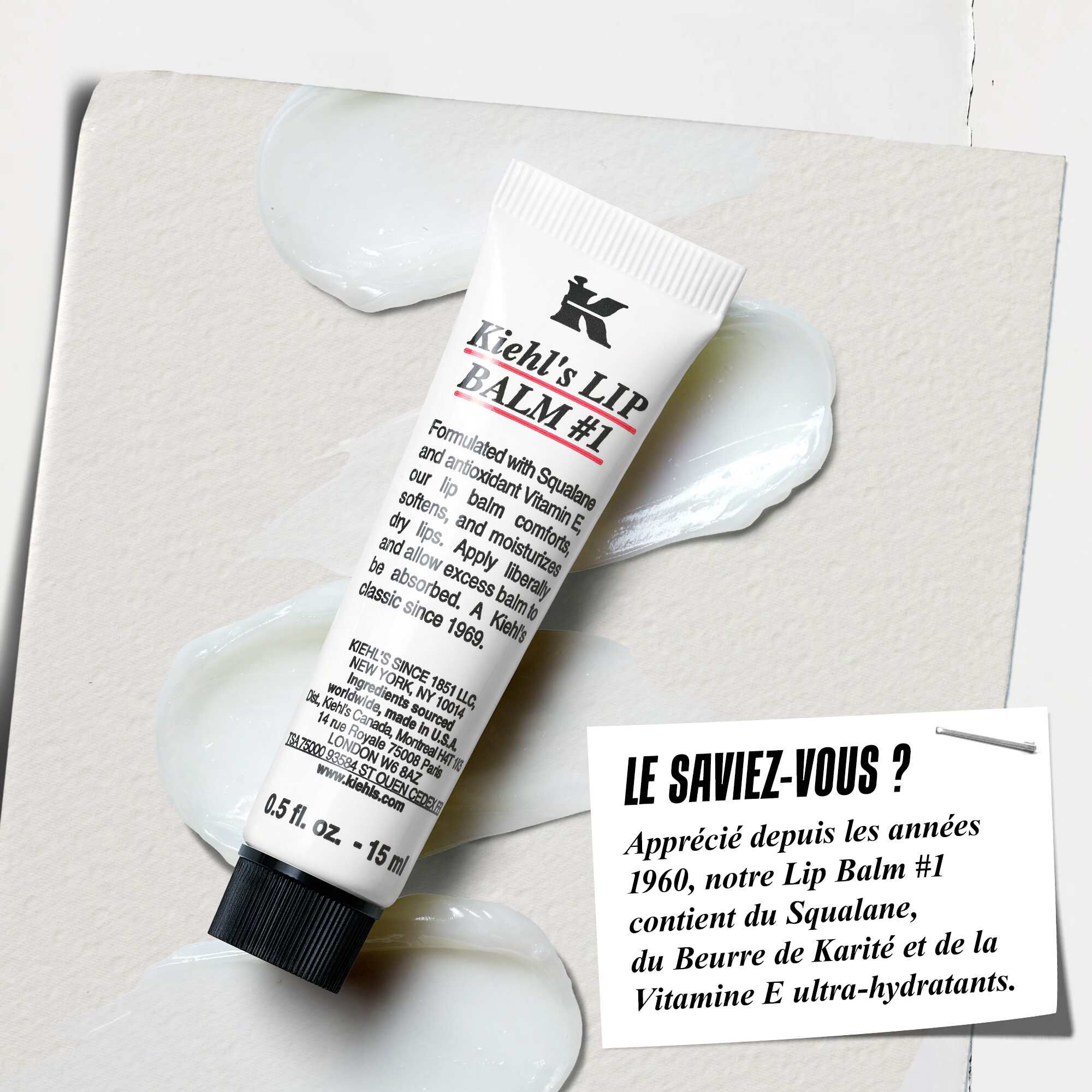 Un tube de Lip Balm #1 sur une surface blanche avec le texte : « Le saviez-vous ? Formule avec du squalane, du beurre de karite et de la vitamine E pour des levres hydratees et plus lisses. »
