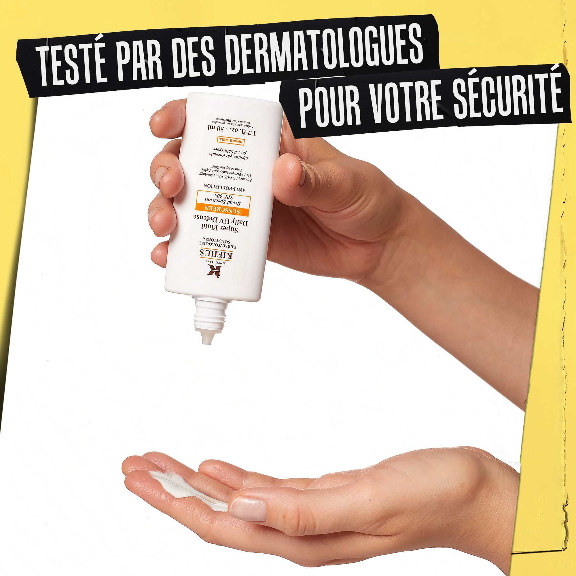 Main recevant une dose d'Ultra-Light Daily UV Defense, avec la mention « Teste dermatologiquement pour la securite ».