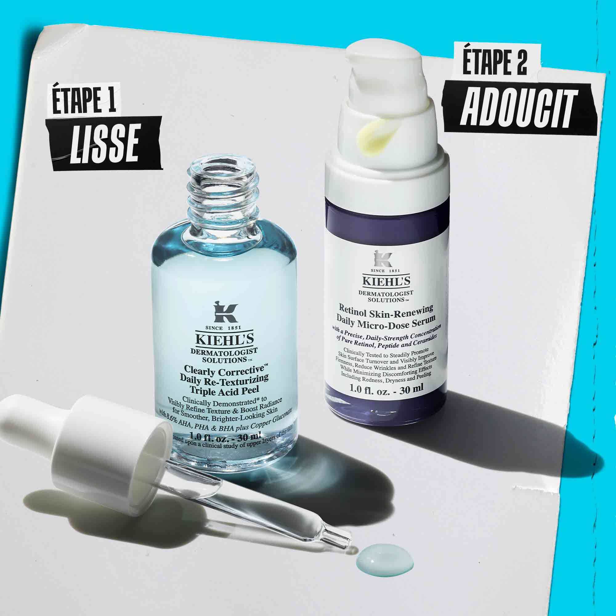 Deux produits Kiehl's sur une surface blanche avec un fond bleu : Clearly Corrective Triple Acid Peel et Retinol Skin-Renewing Daily Micro-Dose Serum.