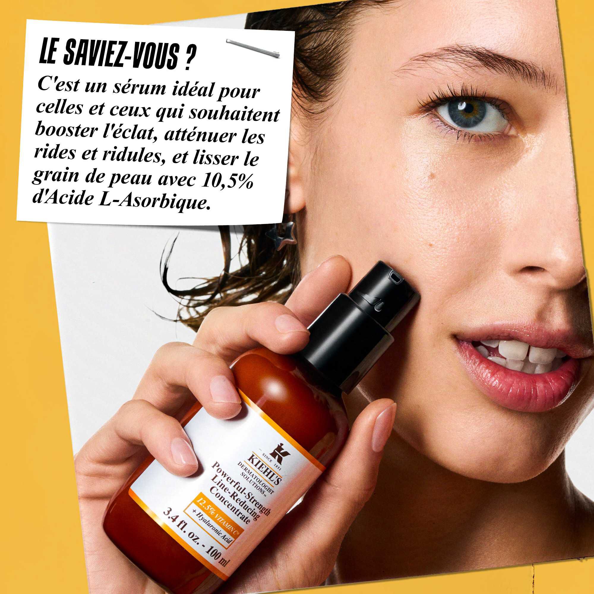 Une personne appliquant le Powerful-Strength Line-Reducing Concentrate sur son visage. Le texte indique : « Le saviez-vous ? Parfait pour le teint irregulier, ce serum hautement efficace est formule avec 12,5 % de vitamine C fragmentee et de l'acide hyaluronique. »