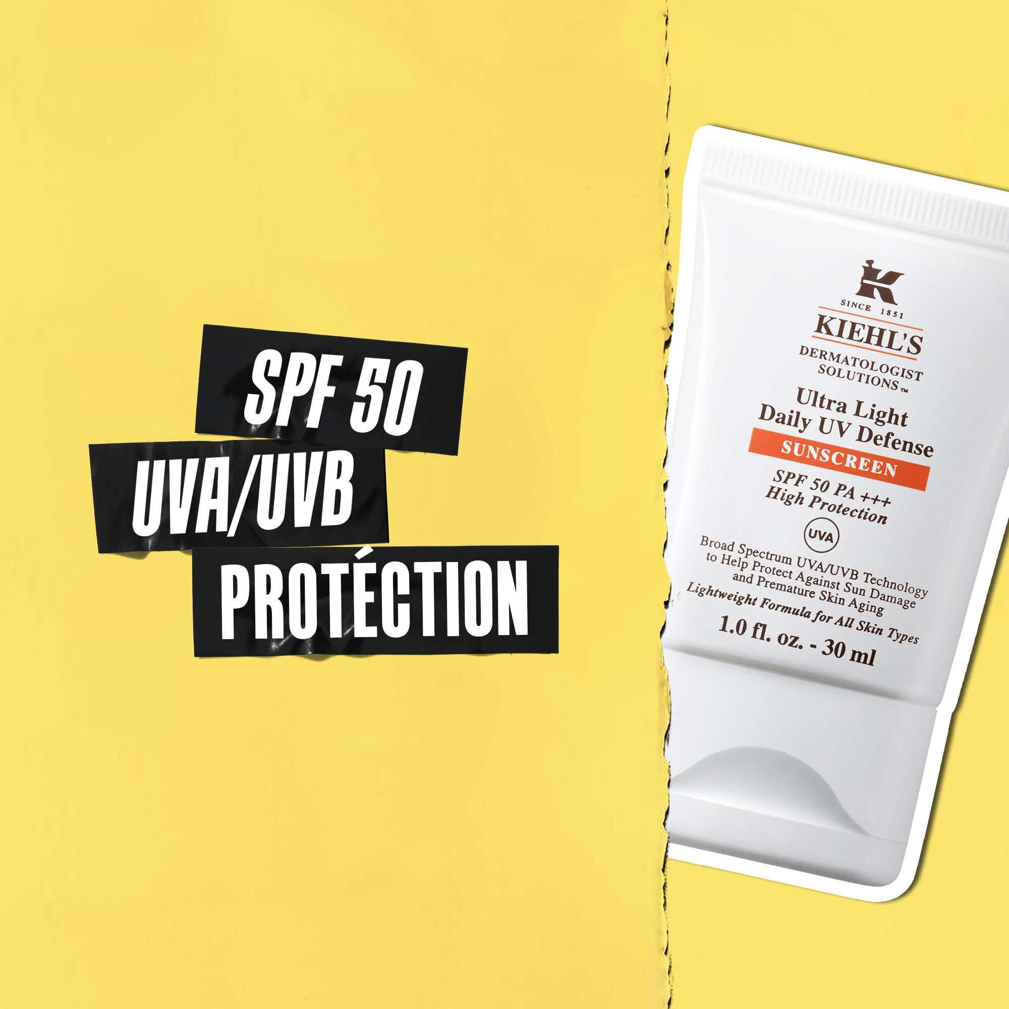 Mention SPF 50 UVA/UVB Protection sur ruban noir avec une image du tube Ultra-Light Daily UV Defense a cote.