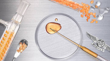 Une scene de laboratoire avec des tubes a essai contenant des cristaux, une plaque de Petri avec une substance doree, et des outils de laboratoire, le tout sur un fond en metal.