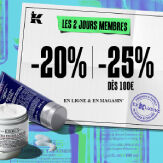 trois flacons de creme kiehl's avec une trousse noire sur un fond beige