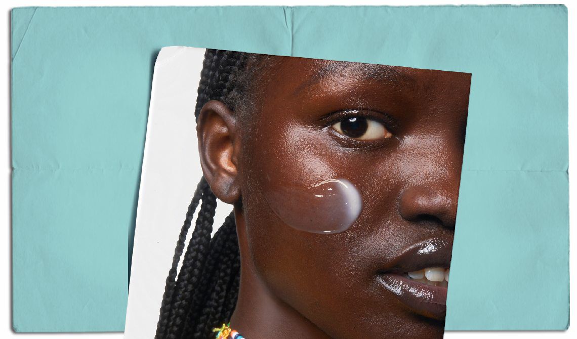 Creme hydratante Ultra de Kiehl's sur un fond marbre, entouree d'olives et d'un petit flacon.