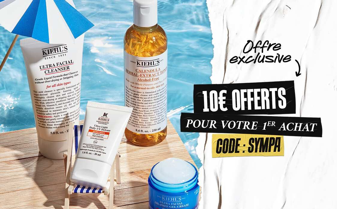 produits kiehl's poses sur une table en bois dans un piscine