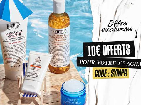 produits kiehl's poses sur une table en bois dans un piscine