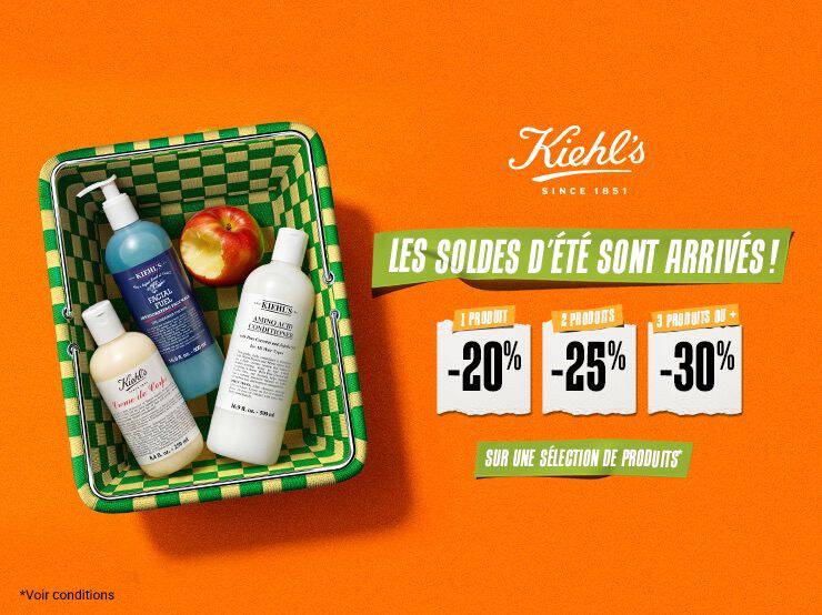 un panier vert et jaune avec a l'interieur une pomme et trois produits de soin de la peau kiehl's sur un fond orange