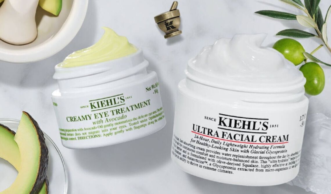 deux pots de creme kiehl's blanc entoure d'avocats