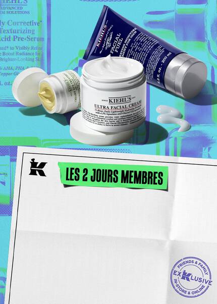 deux pots de creme visage blancs et un tube de creme bleu kiehl's sur un fond bleu
