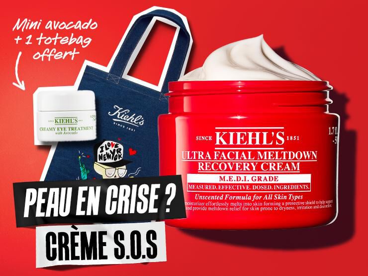 Creme Ultra Facial Meltdown Recovery de Kiehl’s presentee comme un extincteur sur fond rouge, accompagnee d’un sac bleu Kiehl’s et d’un pot de soin des yeux a l’avocat. Des touches de creme blanche decorent les bords. Texte en avant-plan : "Peau en crise ? Creme S.O.S."