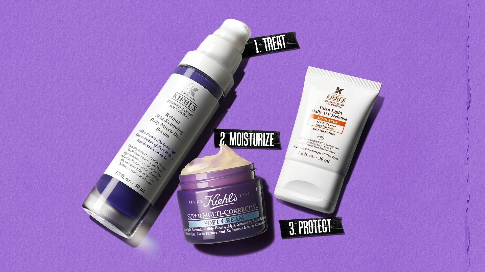 Routine de soins Kiehl's : serum, creme hydratante et protection solaire sur fond violet.