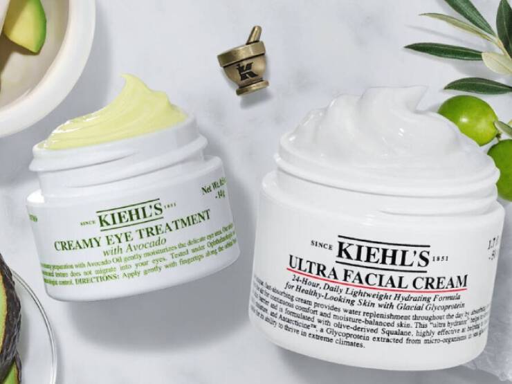 deux pots de creme kiehl's blanc entoure d'avocats